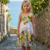 Vestido infantil de algodón estampado con tirantes. 
